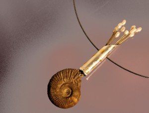 fossil snail with freshwater pearls, silver and fine gold