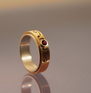 Ruby ring with gold and silver band