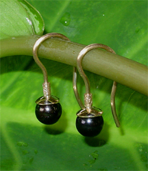 gold earrings with black pearls
