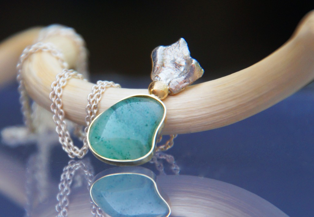 jade pendant with gold and silver