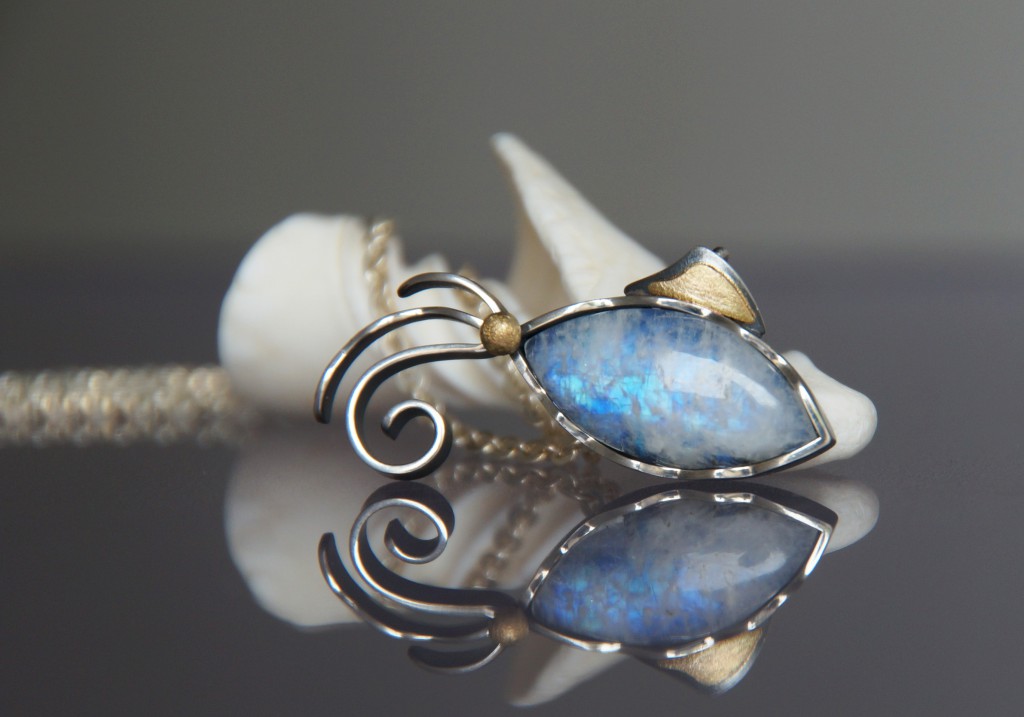 moonstone fish with gold and silver