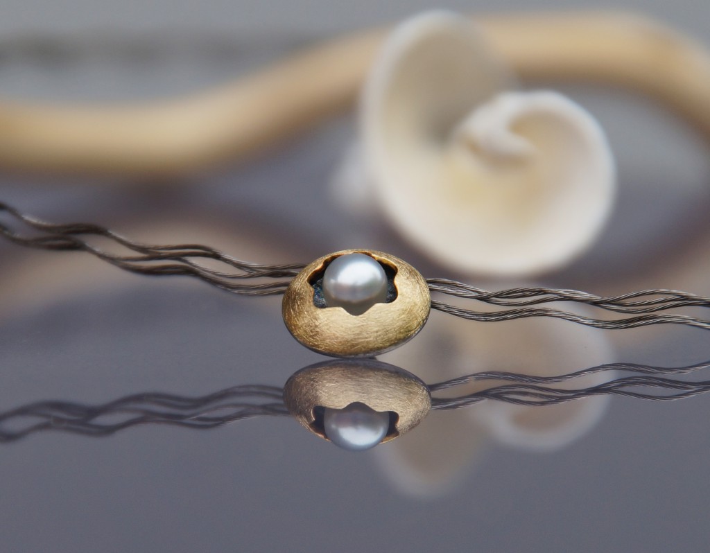 gold and silver pearl pendant