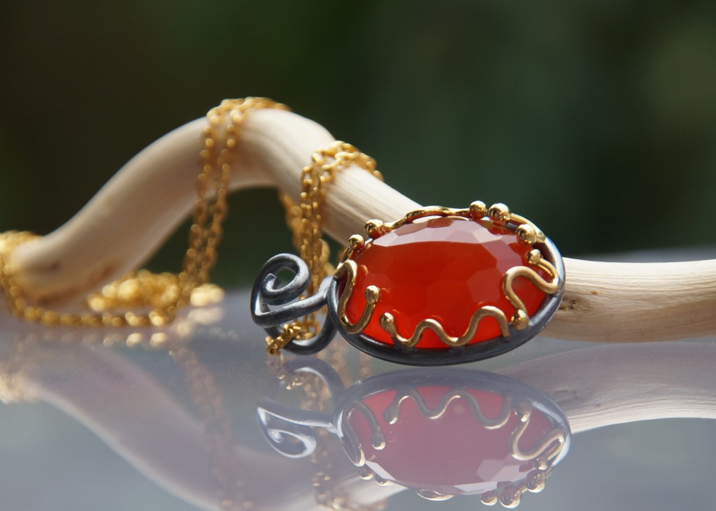 carnelian pendant with gold and oxidized silver